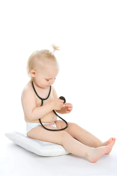 Ребенок со стетоскопом — стоковое фото