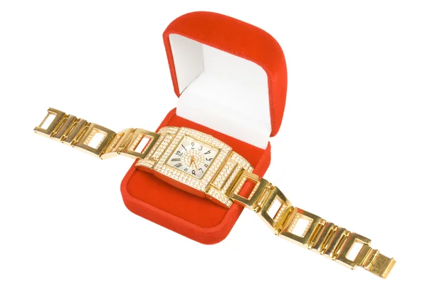 Zlaté hodiny v červené krabici — Stock fotografie