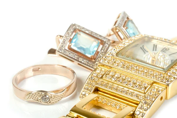 Conjunto de jóias, anel, relógio, brincos Imagens De Bancos De Imagens