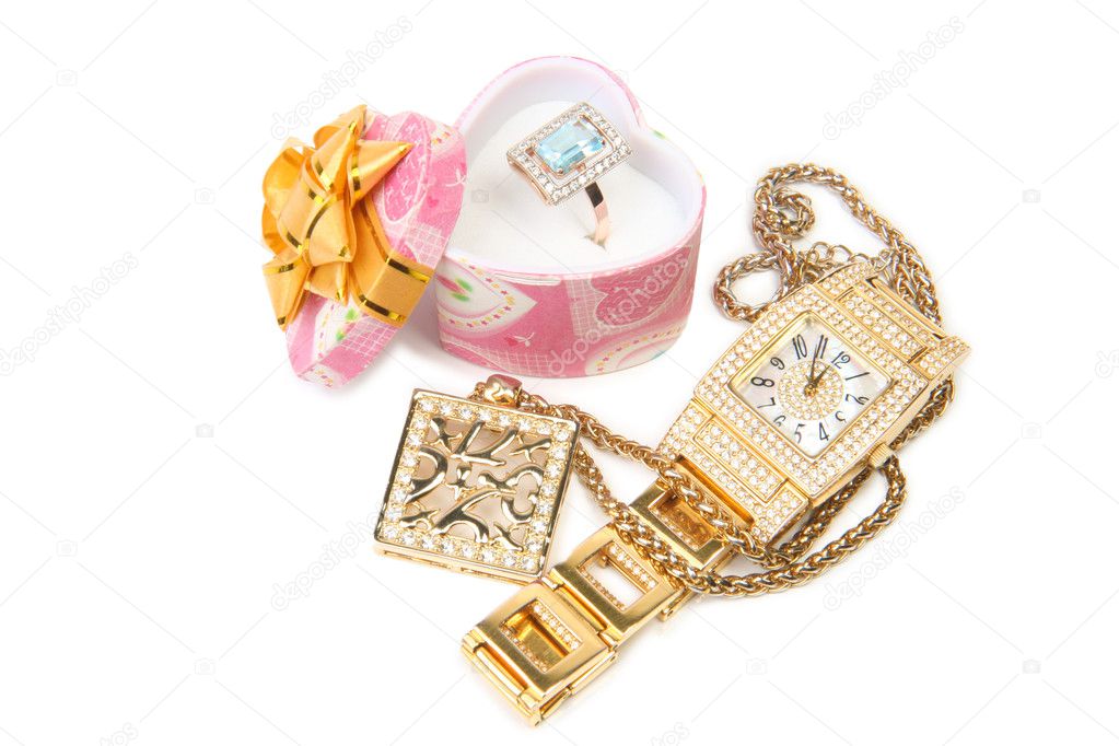 Gold watch, ring and necklace.