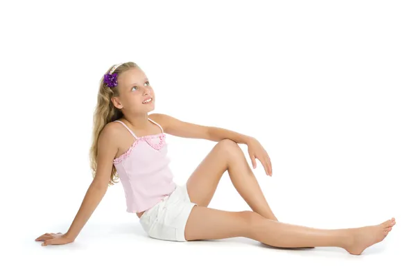 Menina adolescente bonita sentar no chão — Fotografia de Stock