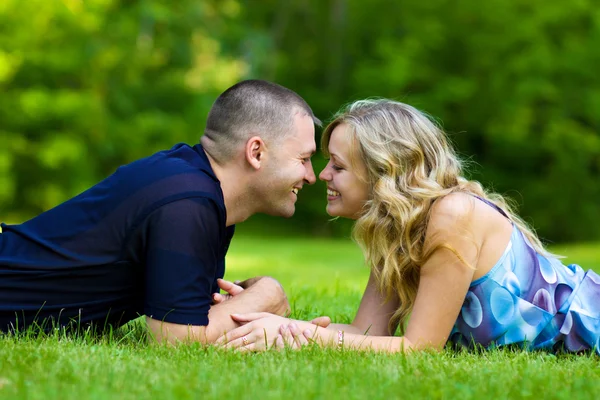 Attractive couple together on meadow — Stock Photo, Image