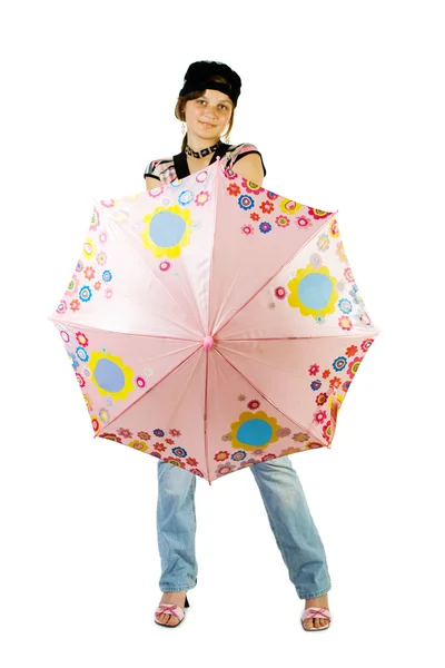 Молодая девушка с зонтиком сидит на полу — стоковое фото
