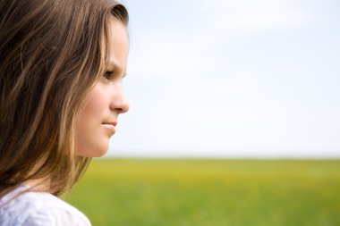 Close-up portrait of pretty young girl clipart