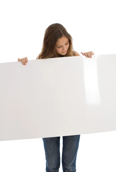 Young girl holding a white banner — Stock Photo, Image