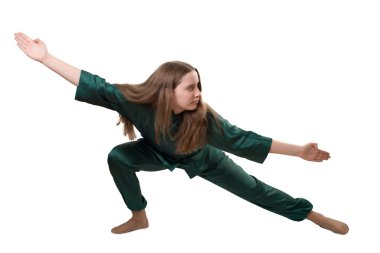 Young girl training martial arts clipart