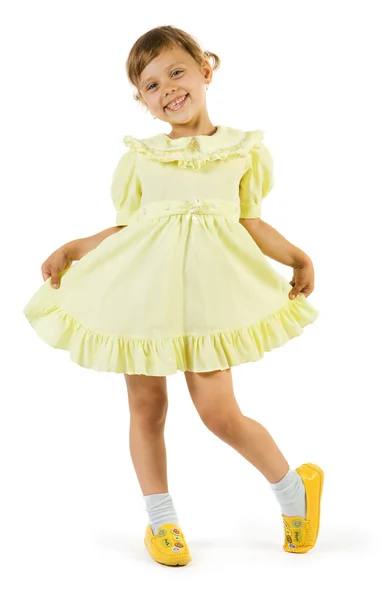 Щаслива дівчина в жовтій сукні — стокове фото