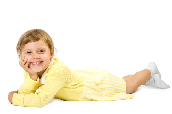 Маленька дівчинка лежить на підлозі . — стокове фото