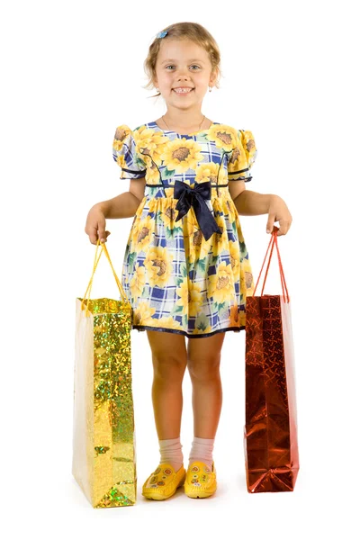 Little girl with shopping bag. — Stock Photo, Image
