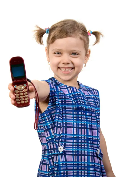 Lite söt flicka visar mobiltelefon — Stockfoto
