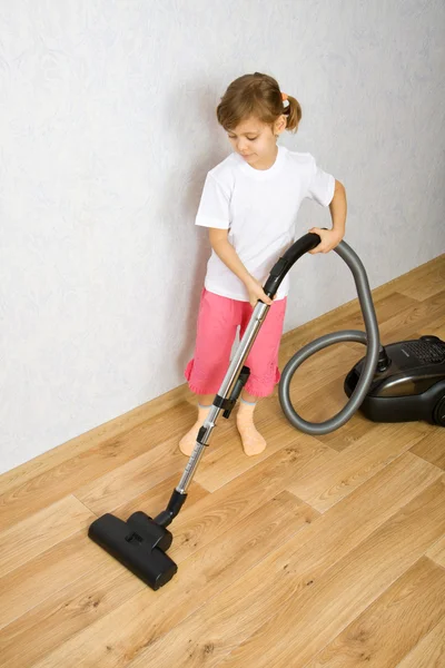 Little girl with vacuum cleaner — Stock Photo, Image