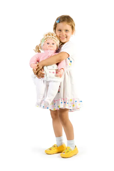 Girl with doll Stock Image