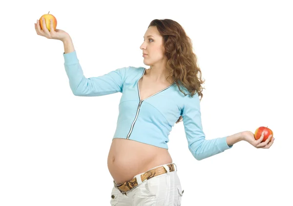 Schwangere mit Äpfeln — Stockfoto