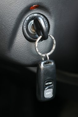 Automobile key in the ignition lock clipart