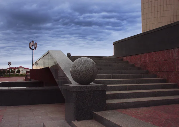 Stock image Kind of steps with a marble sphere