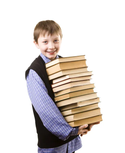 Мальчик с пачкой книг — стоковое фото