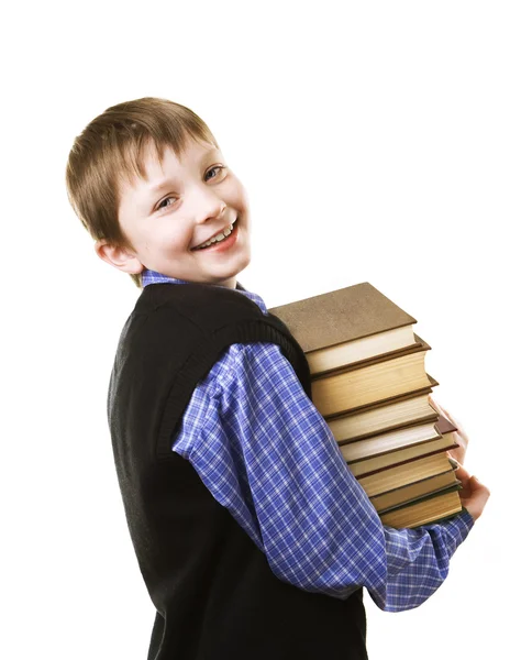 Мальчик с пачкой книг — стоковое фото