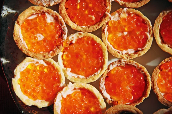 stock image Tartlet with red salmon caviar