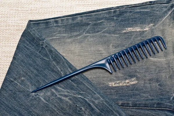 Comb on the jeans — Stock Photo, Image