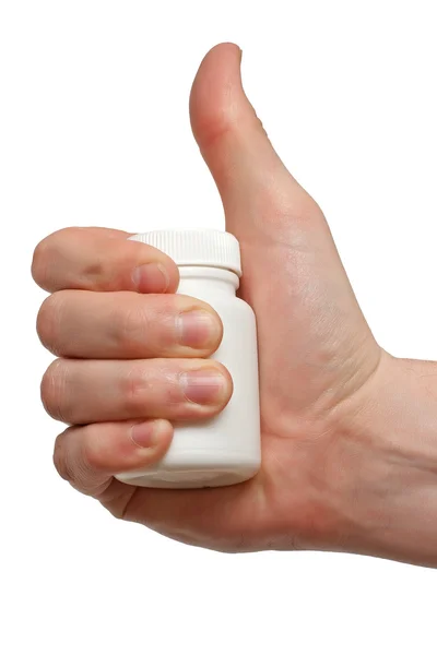 Garrafa com pílulas na mão — Fotografia de Stock
