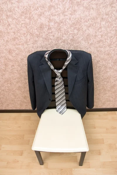 Oblečení na židli — Stock fotografie