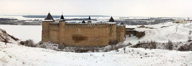 Castle in winter landscape clipart