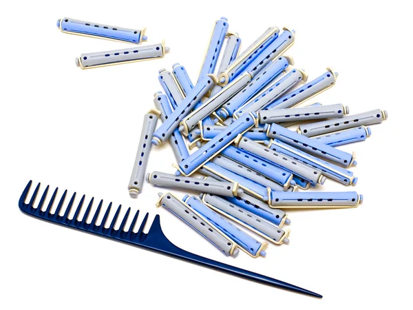 Handle rake and hair rollers — Stock Photo, Image
