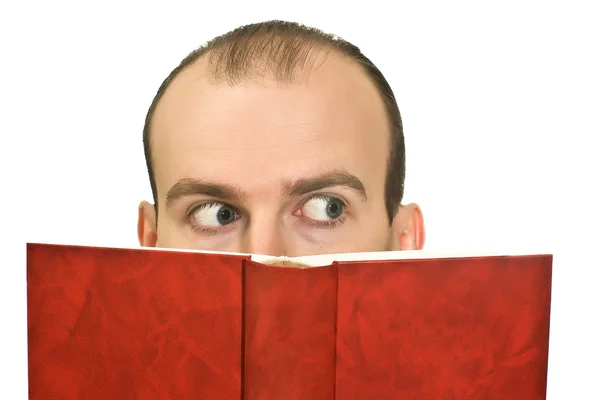 stock image Man hidden behind the book