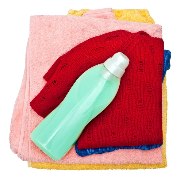 Bottle on the clothes — Stock Photo, Image