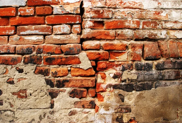 ひびの入ったグランジ レンガ壁の背景 — ストック写真