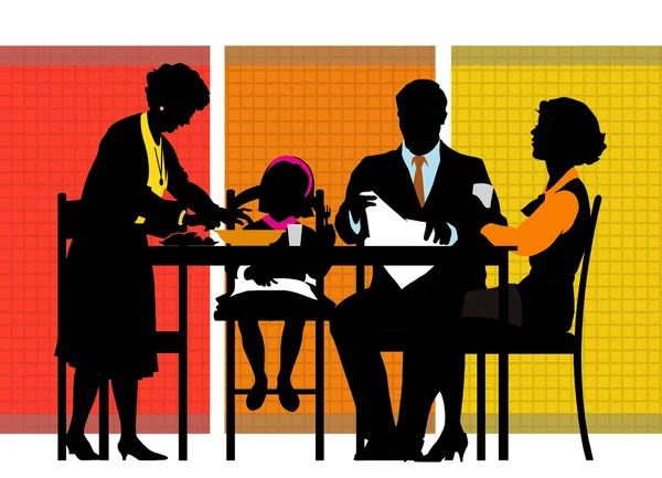 Family sitting at the table during the m — Stock Photo, Image
