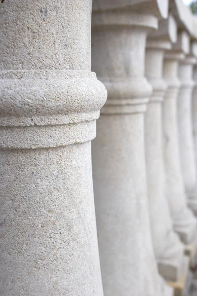 stock image Small carved columns of beige color