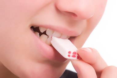 Close Shot of woman eating chewing gum clipart