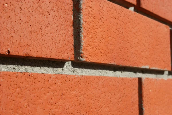 Parede de tijolos vermelhos em perspectiva — Fotografia de Stock