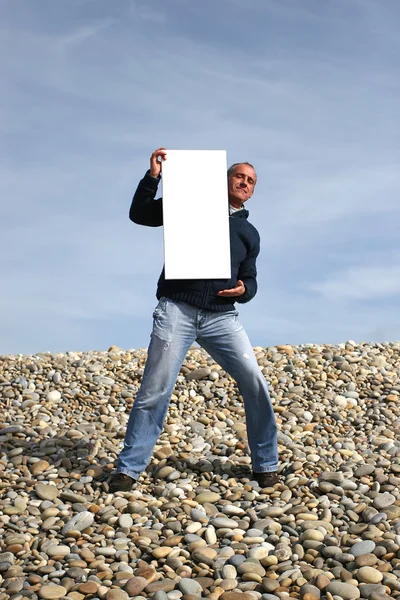 Young Man Holding White Card — Stock Photo, Image