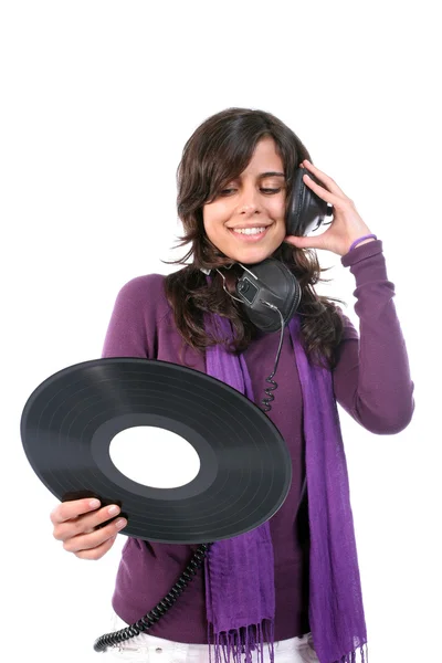 Mooi meisje met vinyl en hoofdtelefoons — Stockfoto
