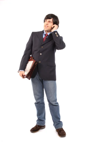 Young business man talking on cellphone — Stock Photo, Image