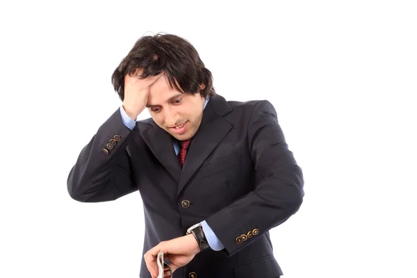 Занепокоєний бізнесмен консультує свого годинника — стокове фото