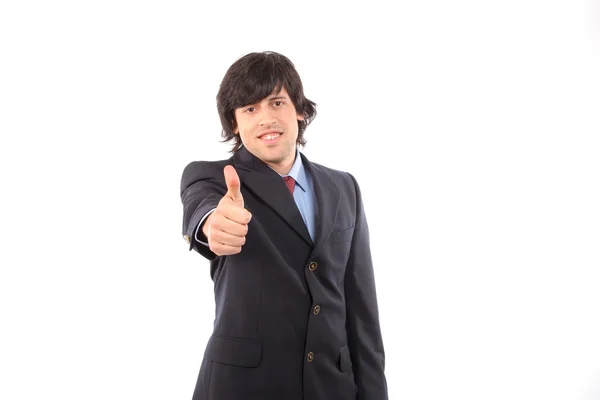 Young business man showing thumb up — Stock Photo, Image
