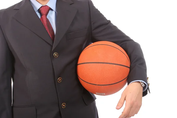 Biznes człowiek posiadający piłkę do koszykówki — Zdjęcie stockowe