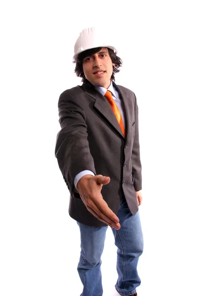 Человек в костюме предлагает пожать руку — стоковое фото