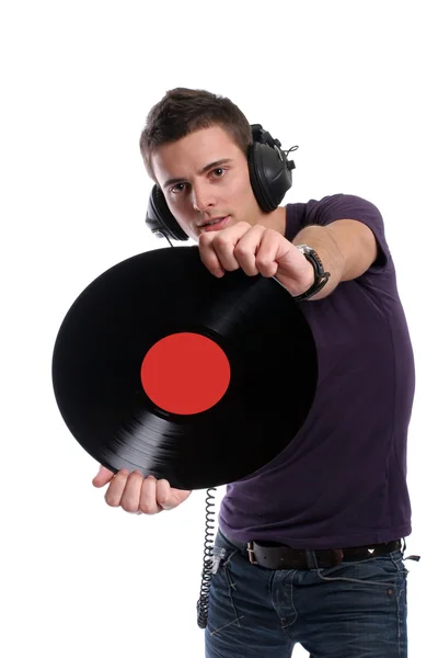 DJ im Kopfhörer dreht einen Teller um — Stockfoto