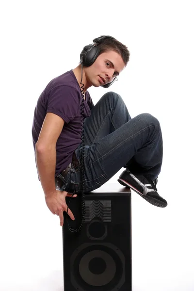 DJ mit Kopfhörer im Lautsprecher — Stockfoto