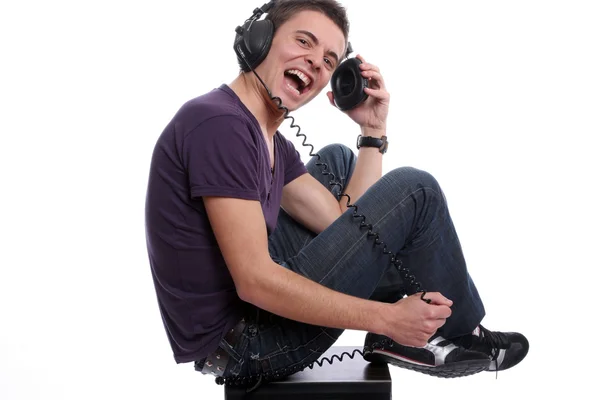 Mladý muž se sluchátky — Stock fotografie