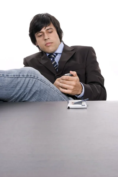 Jonge bezorgd zakenman aan de telefoon — Stockfoto