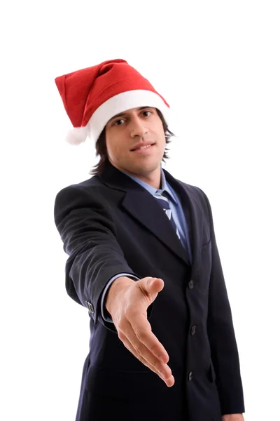 クリスマスの帽子を持ったビジネスマン — ストック写真