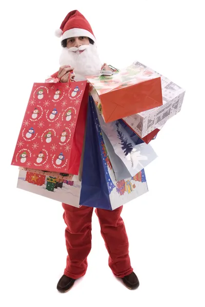 Jovem Papai Noel, cheio de presentes — Fotografia de Stock