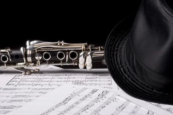 Clarinet, under a hat — Stock Photo, Image