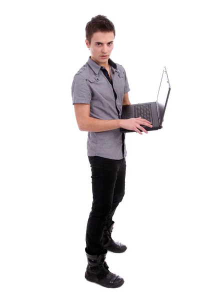 Молодий хлопчик представляє новий ноутбук — стокове фото