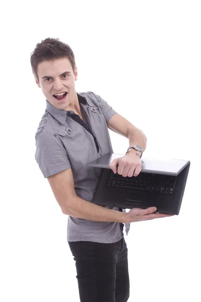 Junger Mann präsentiert Laptop — Stockfoto